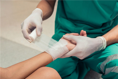 Medical latex examination gloves