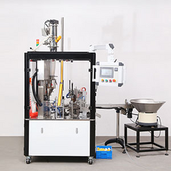 Disc filling and sealing machine