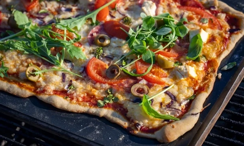 The One Tool You Need For Grilling Pizza This Summer